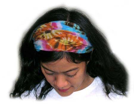 woman wearing mudmee tie dye hair band folded