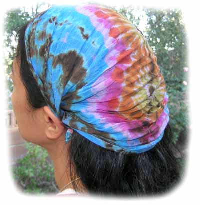 woman with a hair band in blue mudmee tie dye unfolded