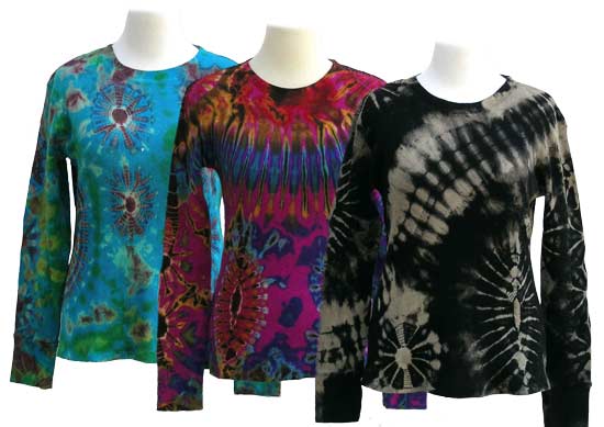 woman with subdued mudmee tie dye henley shirt